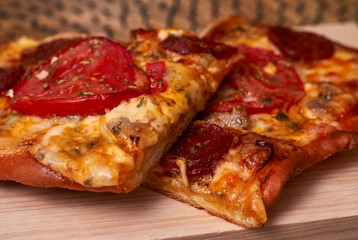 Cheese, tomato and sausage pizza