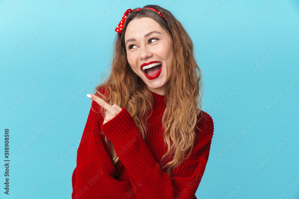 Poster Image of joyful caucasian woman laughing and pointing finger aside