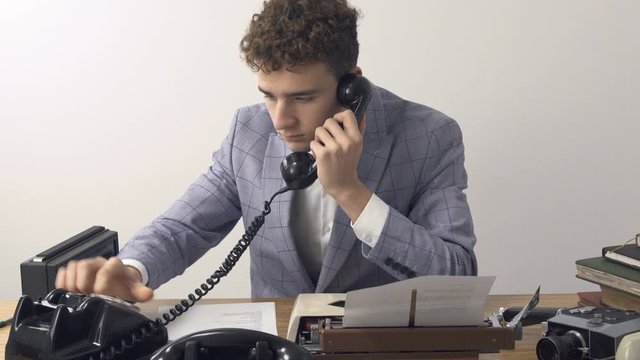 Retro 80s young teen Writer listen news on radio and make phone call by rotary phone. Retro writer artist profession concept.