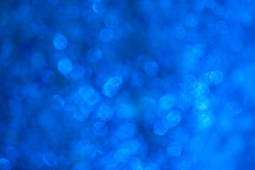 Blue bokeh background with light.
