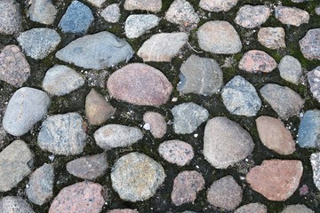 St. Petersburg, Russia, January 2020. A fragment of an old pavement of large cobblestones.