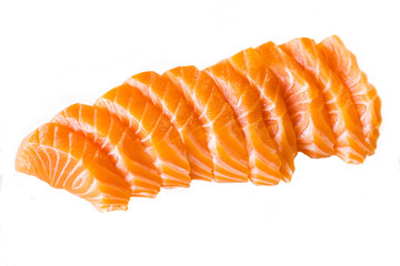 Orange color Salmon cut into pieces, put on a white table for sashimi menu in Japanese food