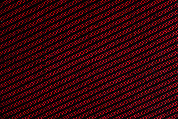 background with red and black thread,black and red binding of threads on a contrast background,handmade embroidery with red and black threads