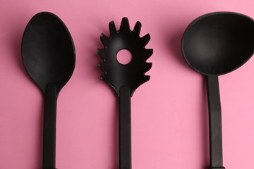 kitchen utensils in color background