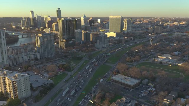  Austin, Texas Skyline and I-35 Traffic - Slow Aerial Pull-Out