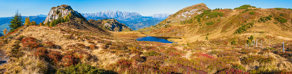Fototapeta premium Autumn alpine Kleiner Paarsee or Paarseen lake, Land Salzburg, Austria. Alps Hochkonig rocky mountain group view in far.