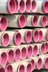 Pink stacked pipes