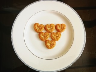 cup of tea and heart shape cookies /biscuits 