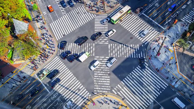 4K, Time lapse Ginza road intersection with crowd people and car in Tokyo, Japan