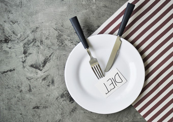 Conceptual image of diet theme. Plate with some food. 