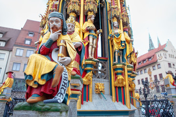 Fototapeta na wymiar sculptures of Beautiful Fountain in Nuremberg