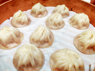 Serving of Chinese Steamed Soup filled Bun Xiaolongbao