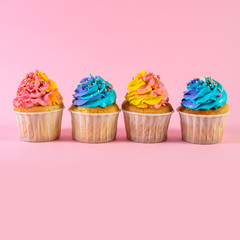 colorful cupcakes with frosting and sprinkles