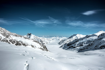 Winter Mountains covered under snow, blue sky, in Switzerland, in winter time - 318928114