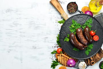 Baked blood sausage. Buckwheat sausage. Top view. Free space for your text.