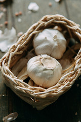  Flatley layout with spices. Garlic cloves on a wooden background. White peeled garlic with salt.