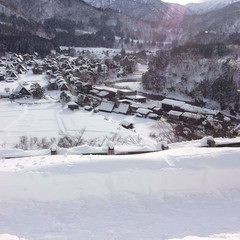 Bright winter day in snow cover on village