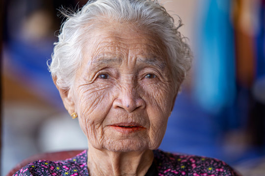 Close-up face of woman elderly asian, portrait