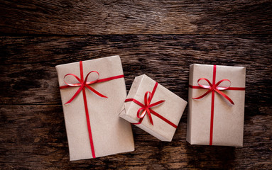 Gift box on old wooden background