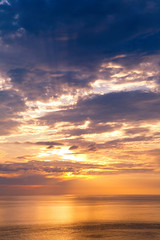 Seascape with beautiful colorful sunset and clouds.