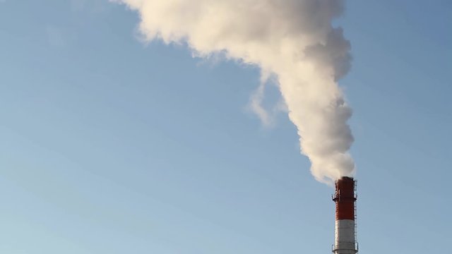 Thick smoke from an industrial chimney	