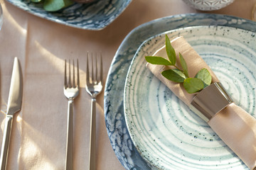 Stylish serving on a green ceramic plate  with cotton napkin