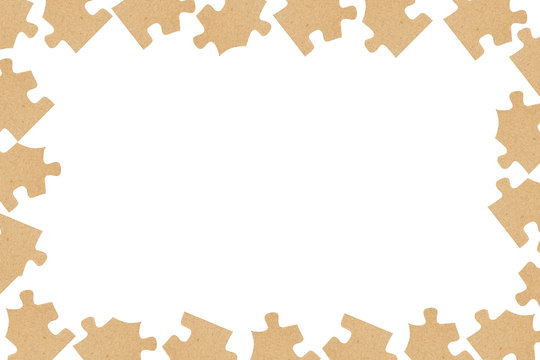 Cardboard puzzles as a frame close up.