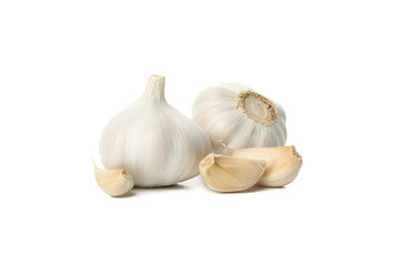 Fresh garlic bulbs and slices isolated on white background