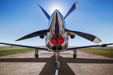 sports plane on a runway is waiting for  take off