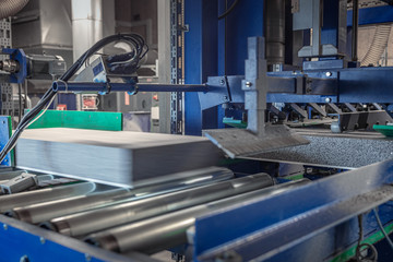 Insulation panels are running through a calibrating machine part 3