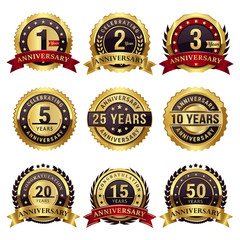 set of anniversary gold badges and labels