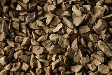 Pile of instant coffee grains making background
