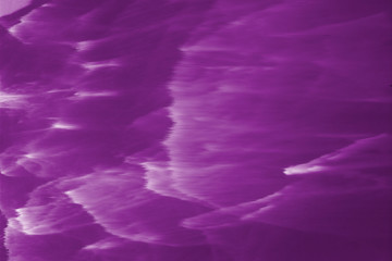 caustic effect, play of shadows on a purple background