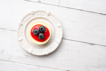 Mini cheesecake with blueberry and cherry topping sweet summer treat