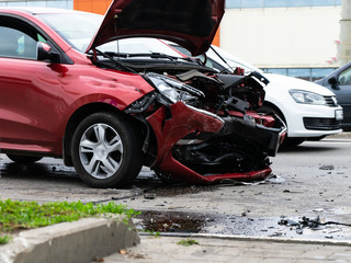 An accident on the street, damaged cars after a collision in the city