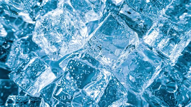 Ice cubes closeup, abstract background.