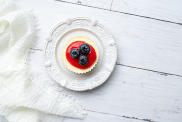 Mini cheesecake with blueberry and cherry topping sweet summer treat