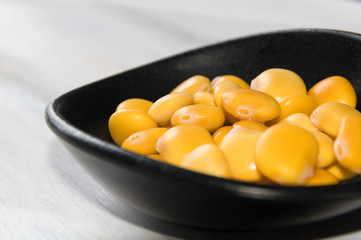 Lupins.  This Healthy snack  has antioxidant and  cardioprotective properties. Lupine is a yellow edible seed.