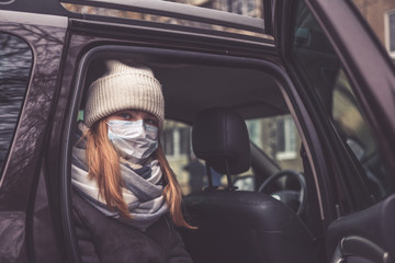 MERS-CoV Chinese infection Corona Virus masked girl on the background of the city in smog, the concept of the epidemic of the virus in China coronavirus nCov