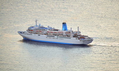 Fototapeta na wymiar A big ship moving on water near the Madeira Portugal