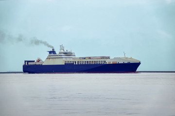 cargo ship departing from port