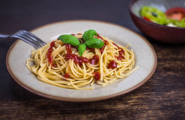 spaghetti with ketchup and basil