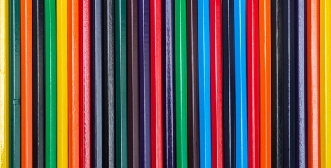 Colorful background from pencils. All the colors of the rainbow.
