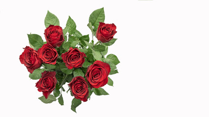Bunch bouquet of red roses isolatet on white background, top view with space for text