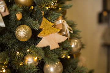 golden christmas tree decorations, place for text