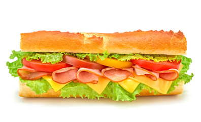 Fresh submarine sandwich with ham, cheese, tomato, lettuce salad, isolated on white. Colorful tasty baguette homemade large sub sandwich with vegetables. Fast food concept