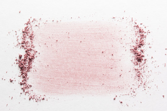 Pale pink blush, face powder smudged on white paper. Nude eye shadow smear. Makeup background