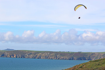 Paraglider above Newgale Beach, St Brides Bay, Wales	