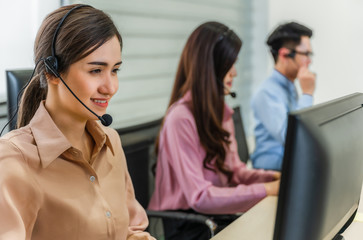 Call center operators. Beautiful asian woman and teamwoek working service consulting clients