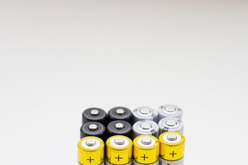 positive contacts side of finger AA batteries